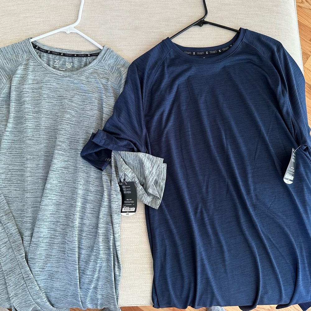 Xersion. 2 shirts total. Both Tall XL.  Paid $60 for both.dry fit work out T’s